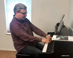 Conductor Milen Nachev getting to know his brand-new Yamaha with a Beethoven piano sonata. The Yamaha’s manual, he says, is 350 pages long.