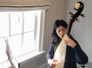 Pipa player Yu Lian working on an ancient Chinese piece that she is still planning on performing solo.